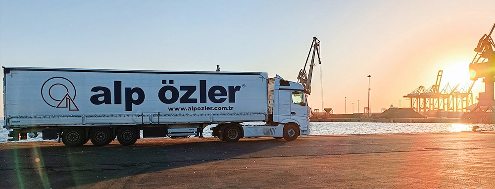 Alp Özler Lojistik Logo